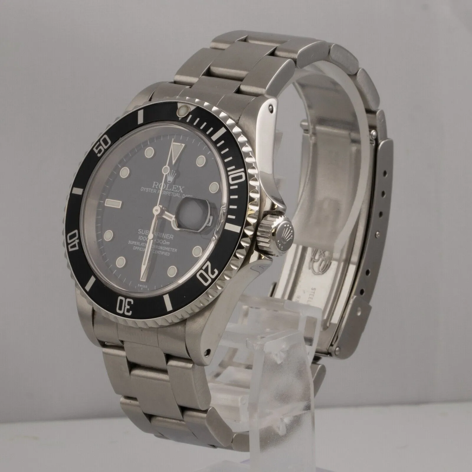 Rolex Submariner 1999, 40mm Stainless Steel Watch with Black Dial, Model 16610 - Includes Original Box & Papers