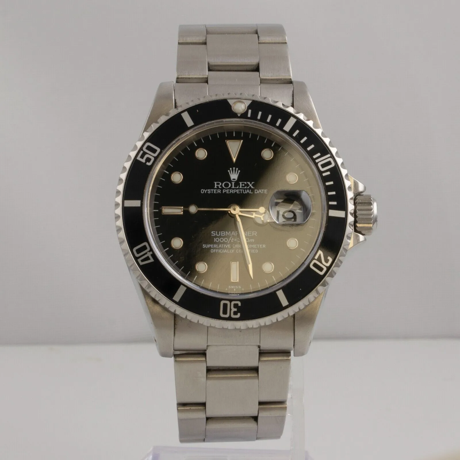 Rolex Submariner 1999, 40mm Stainless Steel Watch with Black Dial, Model 16610 - Includes Original Box & Papers